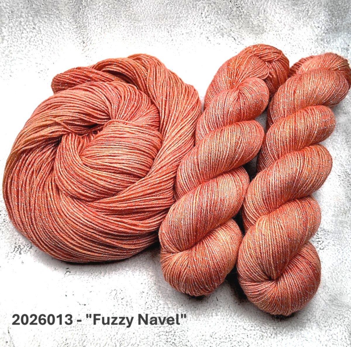 2026013 - 4 Ply Hand Dyed Sparkle Yarn "Fuzzy Navel"